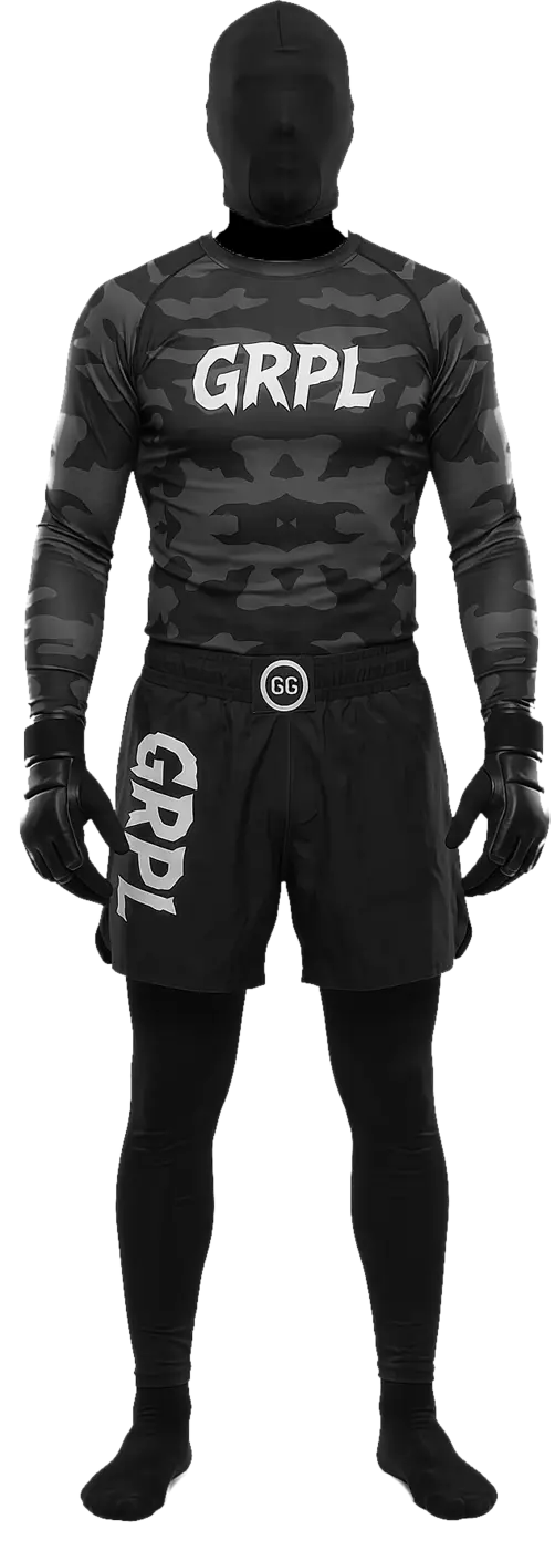 Masked fighter wearing the Grapple Gear long sleeve camo rash guard and GRPL fight shorts